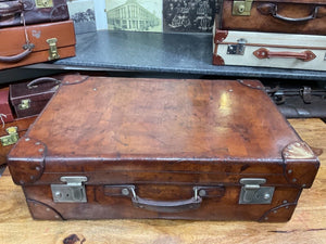 antique large heavy leather finnigans of bond street quality suitcase c.1900
