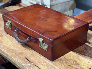 The classic beautiful leather suitcase made by Rawling Bros Leamington Spa.