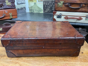 antique large heavy leather finnigans of bond street quality suitcase c.1900